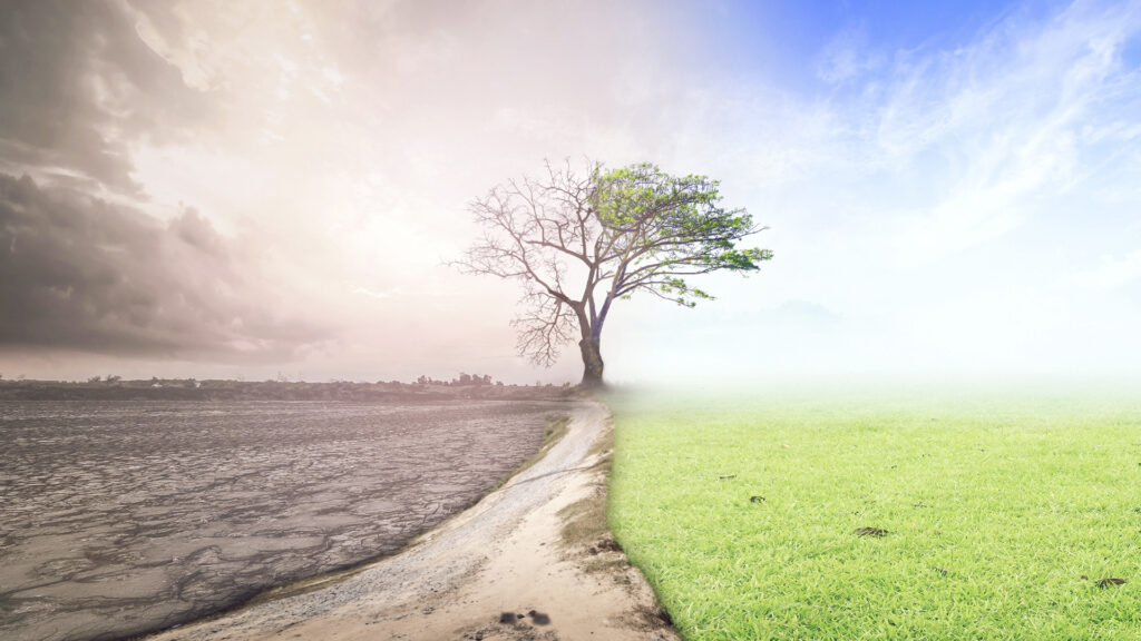 Un lado del paisaje esta contaminado son gases de efecto invernadero, el otro lado es verde y cielo azul. Efecto del cambio climático